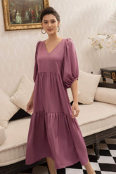Flowy silk midi dress with puffed three-quarter sleeves and gathered tiered silhouette